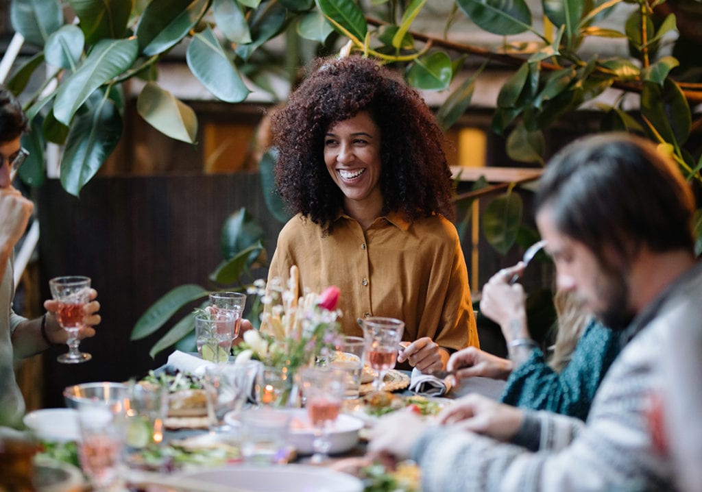 group of friends dining on a restaurant patio